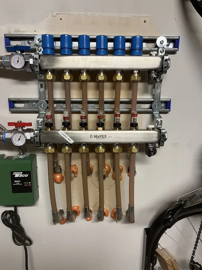 Plumber performing Gas Line Installation at a residential property in Rochester